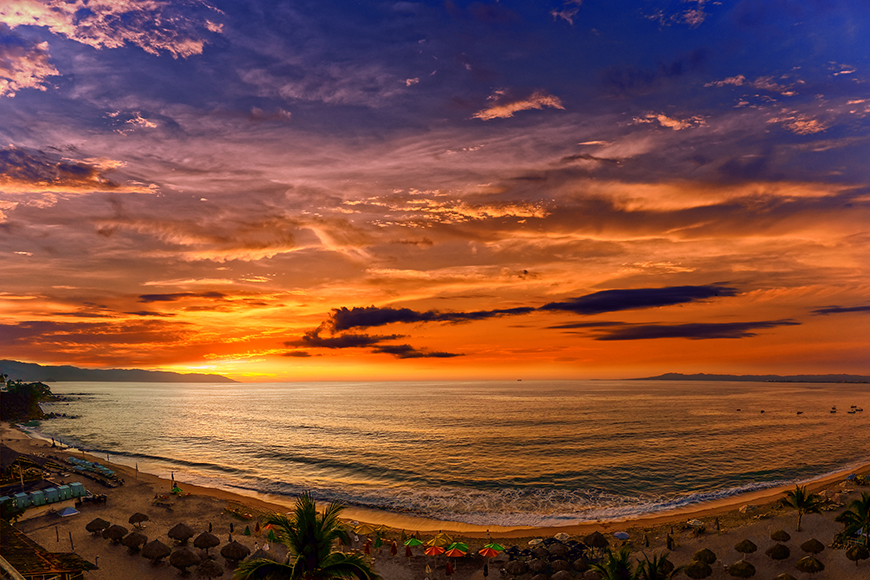 puerto vallarta beach at sunset.