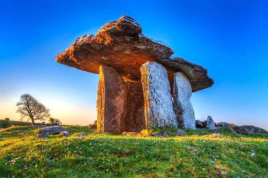 Poulnabrone portal tomb in Burren at sunrise, Ireland 