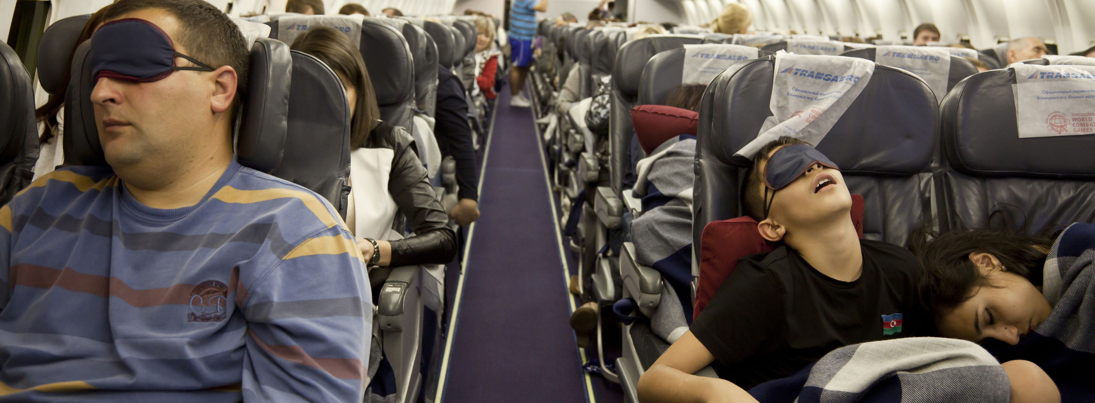 How to Sleep on the Plane: A Guide to Sleep Aids