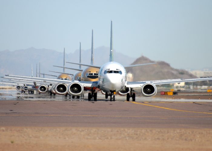 Airplane - Nondescript Row of Planes Airfare Sales