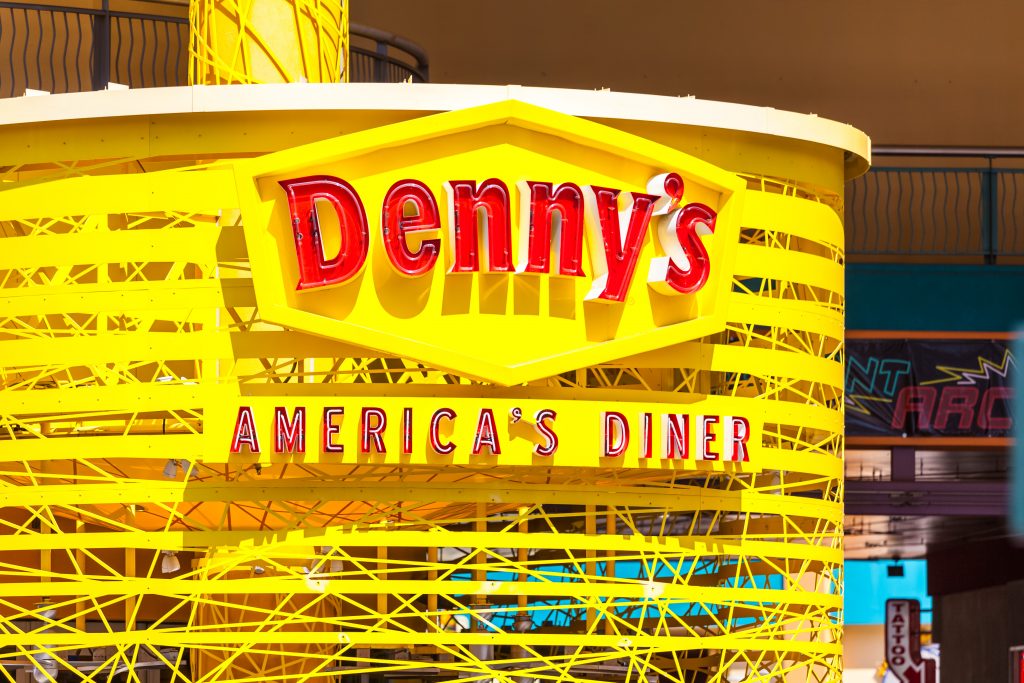 A large sign for Denny's diner