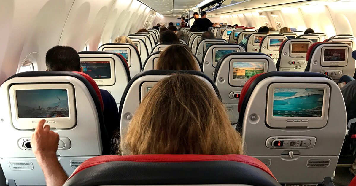 https://www.smartertravel.com/wp-content/uploads/2017/06/airplane-seats-woman-in-middle-1200x627.jpg