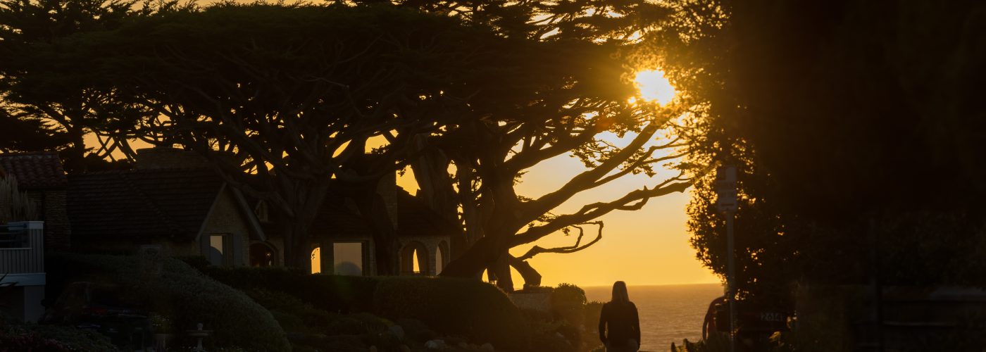 person walking at sunset in Carmel-by-the-Sea