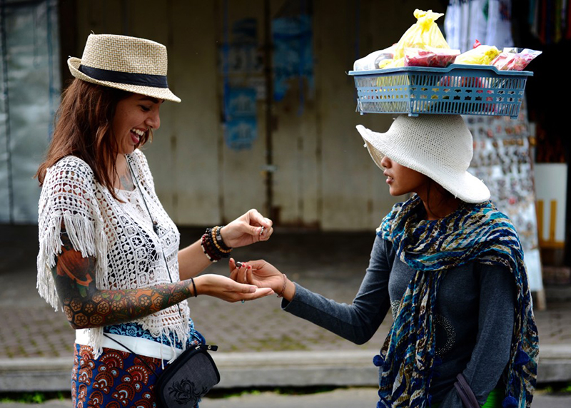 buying fruit in bali women-only travel 