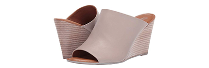 Tan wedge sandals by Franco Sarto