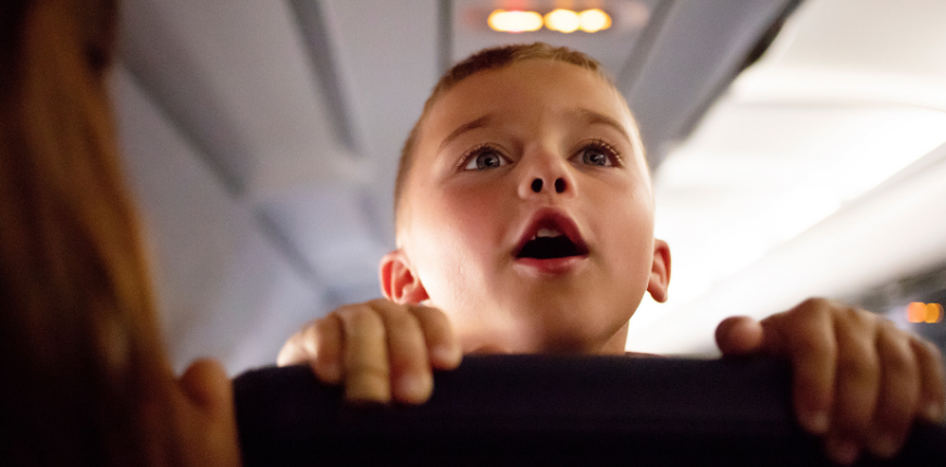 kid on airplane talking