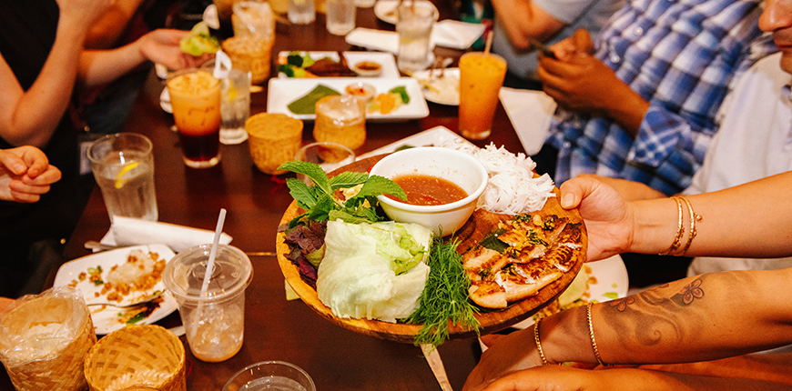 table full of food at vientiane cafe philadelphia.