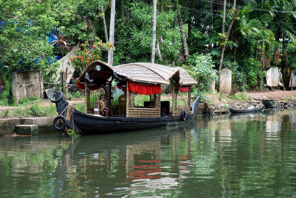 boat in alappuzha india on canal waterways.