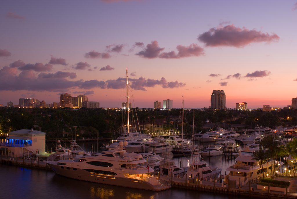 boats in fort lauderdale harbor at dusk.