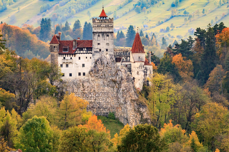 fall foliage at dracula's castle, romania.