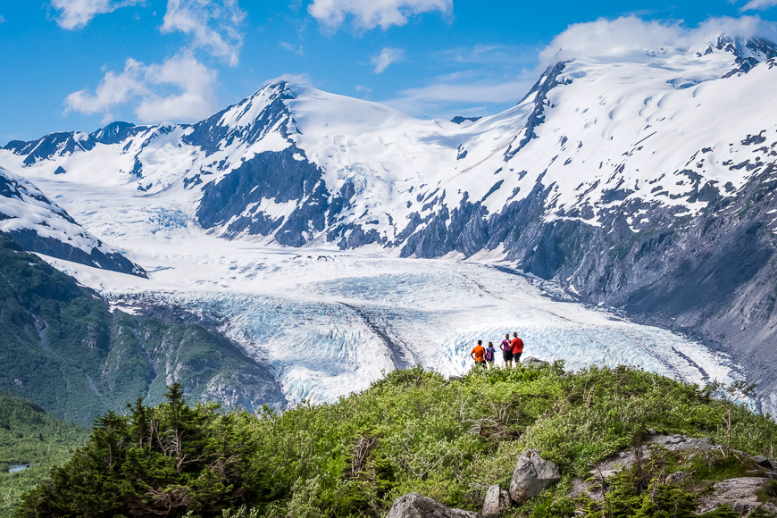 Hikers enjoy the view of Portage Glacier from Portage Pass Trail outside Anchorage, Alaska. 