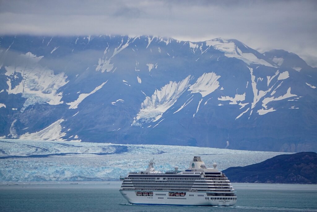 alaska iceberg with cruise ship