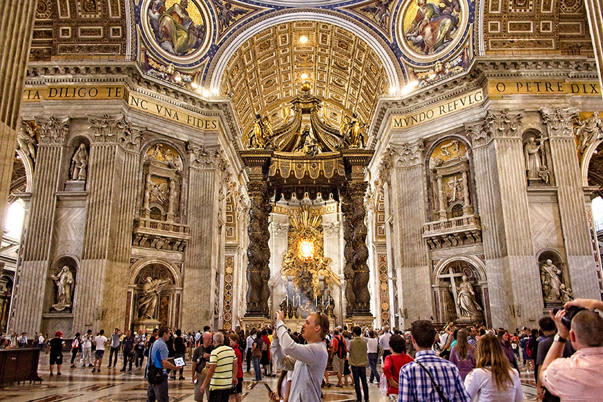 Saint Peter's Square and Basilica tourists taking photos