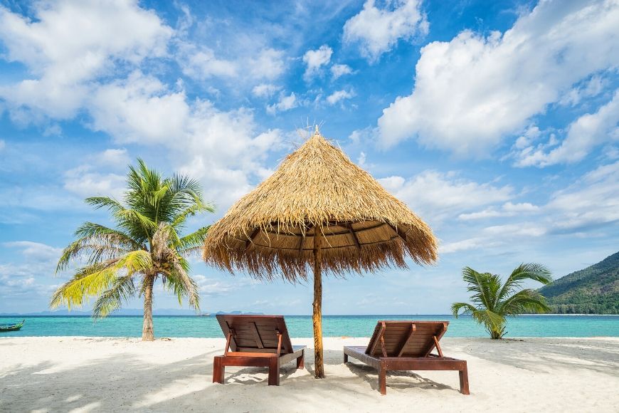 beach chairs on a bahamas beach.