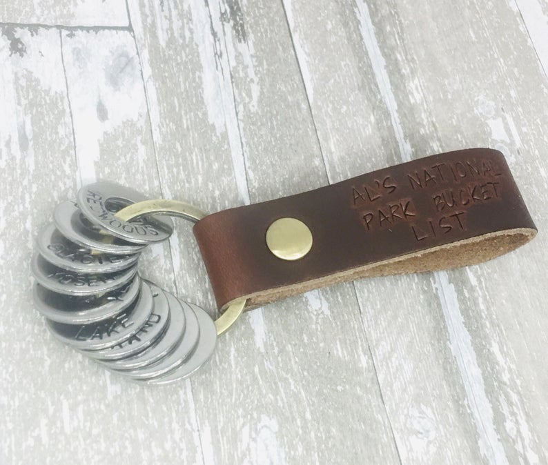Personalized keychain made from stainless steel washers held together by leather band
