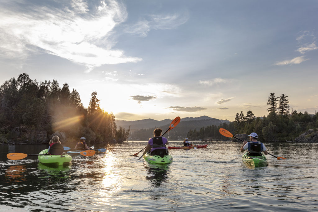 Group kayaking on Flathead Lake, Montana