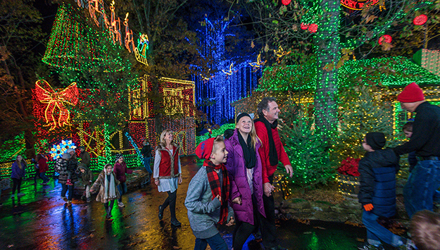 Family exploring the An Old Time Christmas event at Silver Dollar City