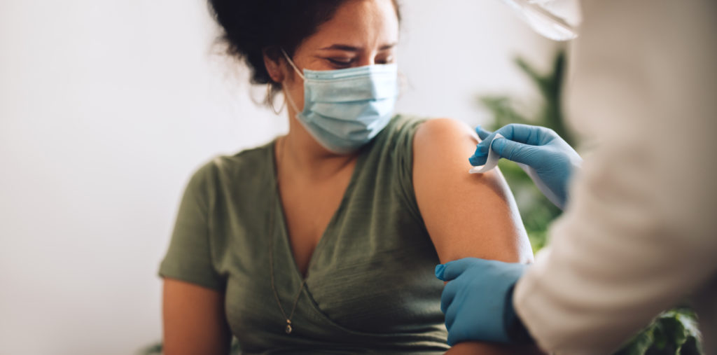 Woman getting the COVID-19 vaccine
