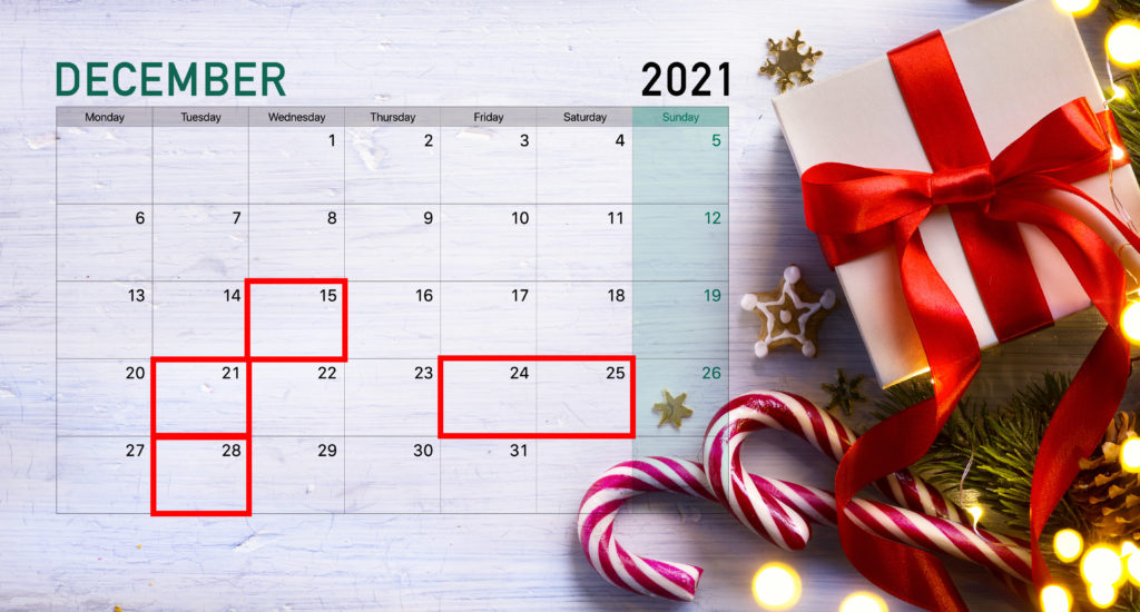 Calendar on Christmas backdrop showing the best days to fly during the Christmas season 2021