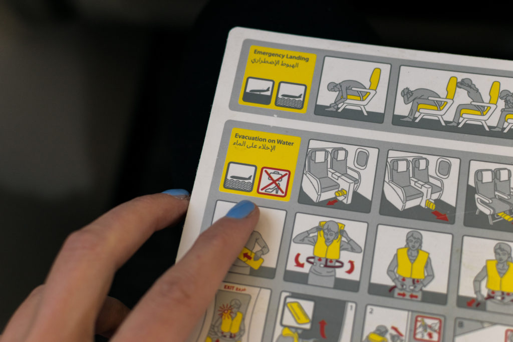 Close up of safety card on airplane