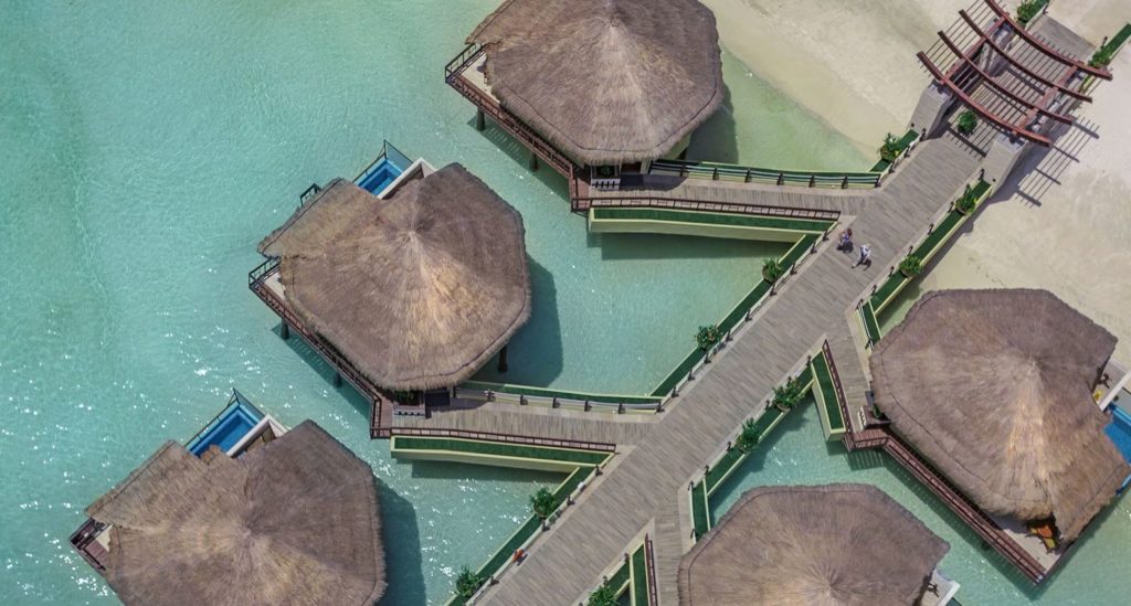 Overhead view of the overwater bungalows at Palafitos Overwater Bungalows
