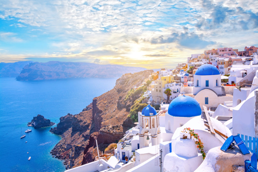 White and blue houses on the coast of an island in Greece