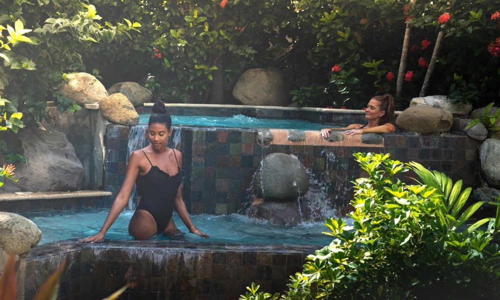 Two women in multi-level spa tubs at the spa at Half Moon, Jamaica 