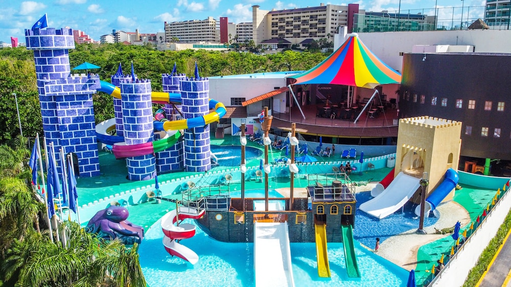 Children's pool with castle, pirate ship, and circus tent at Seadust Cancún All-Inclusive Family Resort, Cancún Mexico