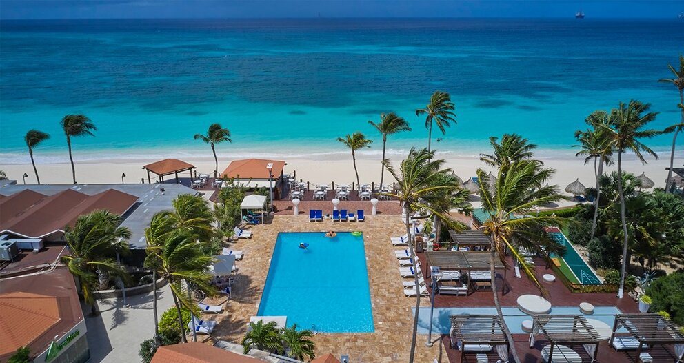 Aerial view of the pool and coastline at Divi All Inclusive Resorts, Aruba