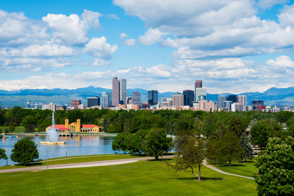 Skyline view of Denver, Colorado with city park in foreground