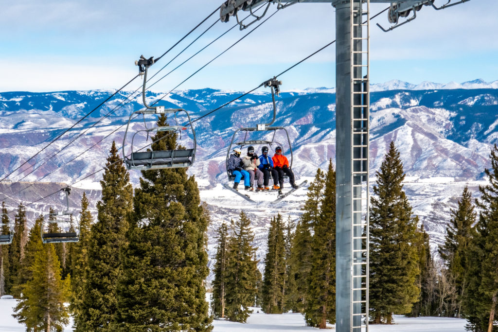 People riding the ski lift in Alpine Springs in Colorado