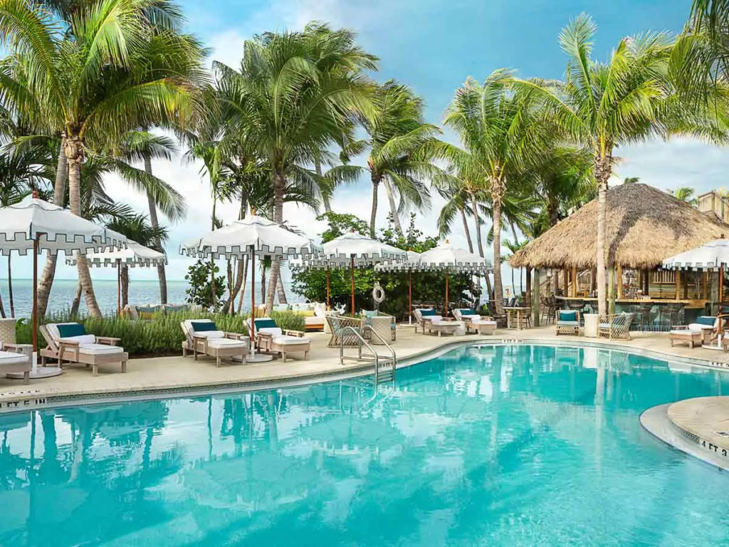 Pool and outdoor seating at Little Palm Island Resort & Spa, Florida