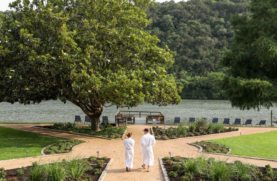 People walking in the courtyard of Lake Austin Spa Resort, Texas