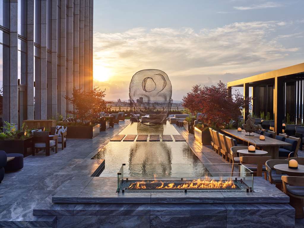 Rooftop eating area and lounge at Equinox Hotel in New York City