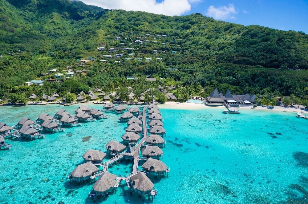 Aerial view of the overwater bungalows at Sofitel Moorea Beach Resort, Moorea Island, French Polynesia