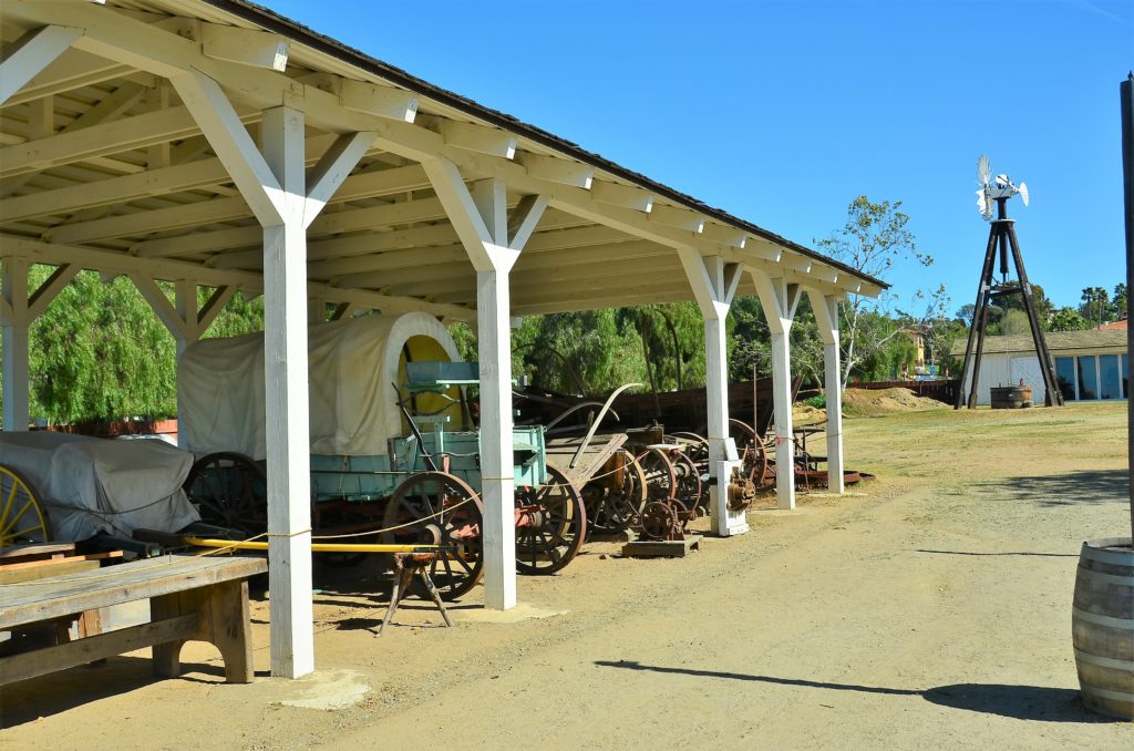 Old style carriages beneath an awning in Old Town, San Diego, California 