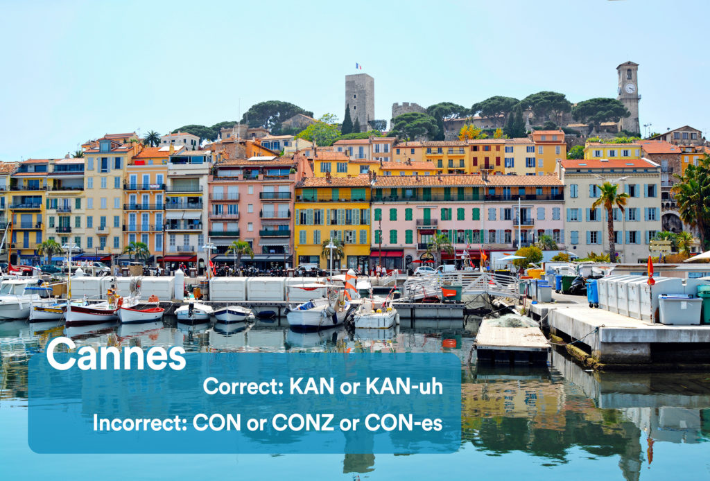 Marina in Cannes, France with graphic overlay showing the correct and incorrect way to pronounce "Cannes"