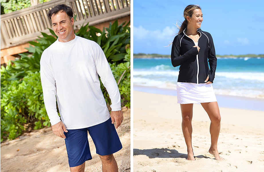 Men standing in yard wearing the UV Skinz Men’s Long Sleeve Sun & Swim Shirt with UPF 50+ in white (left) and woman standing on the beach wearing the UV SKINZ UPF 50+ Women's Water Jacket (right)