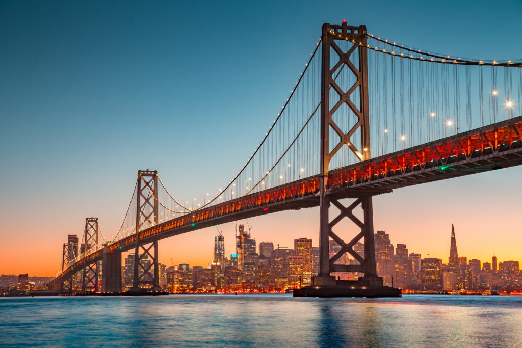 Oakland Bay Bridge and San Francisco skyline at sunset
