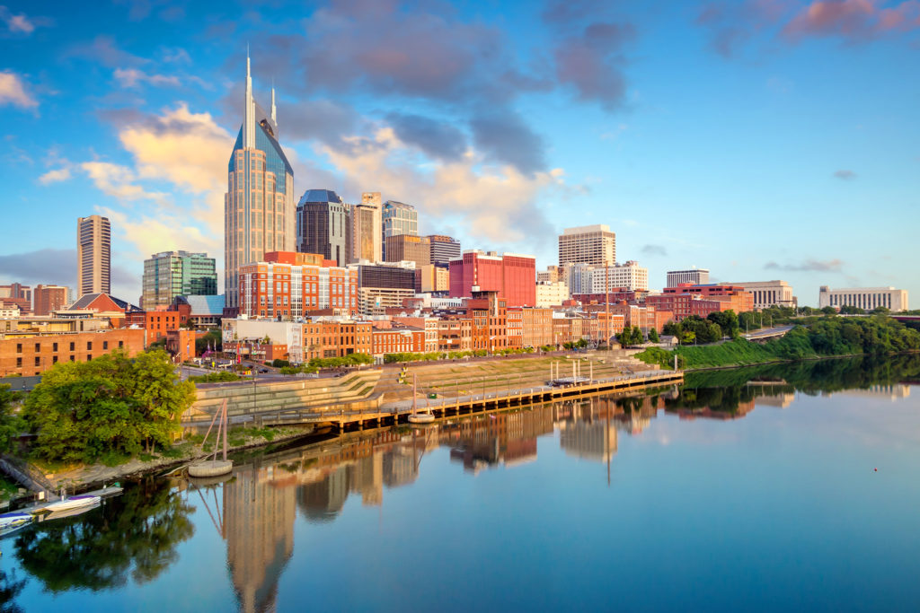 Skyline of downtown Nashville, Tennessee next to the water on a sunny day