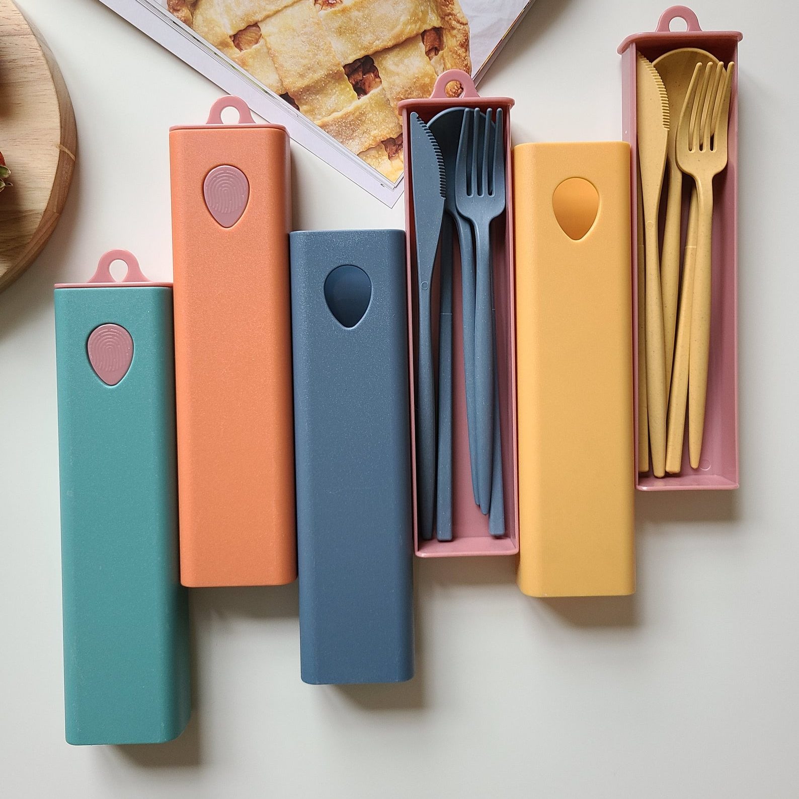 Reusable cutlery sets in colorful carrying cases