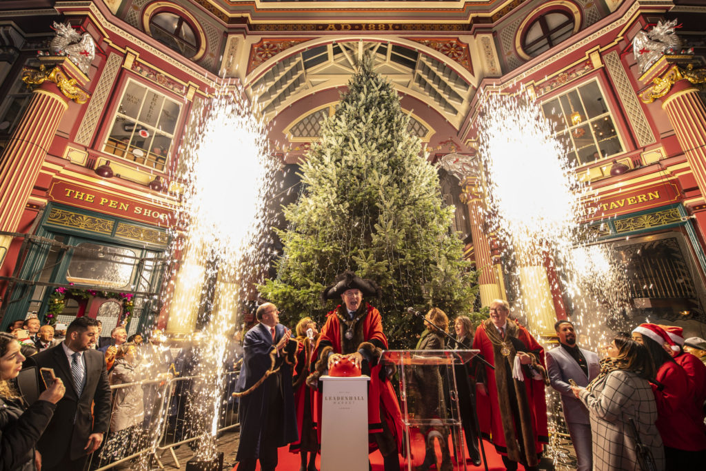 The Lord Mayor of London switching on the holiday lights at the annual ceremony in Leadenhall Market, one of the oldest markets in the city.