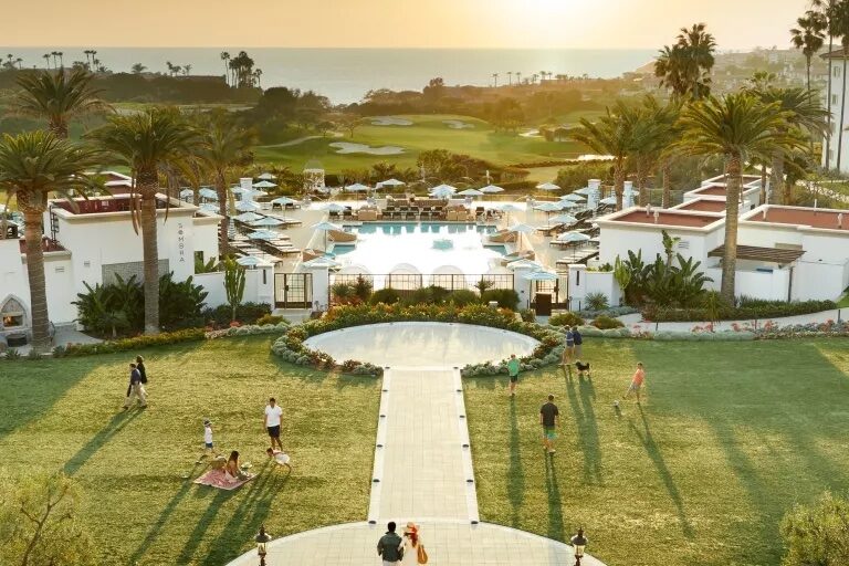 Exterior grounds and pool at the Waldorf Astoria Monarch Beach Resort and Club overlooking the ocean
