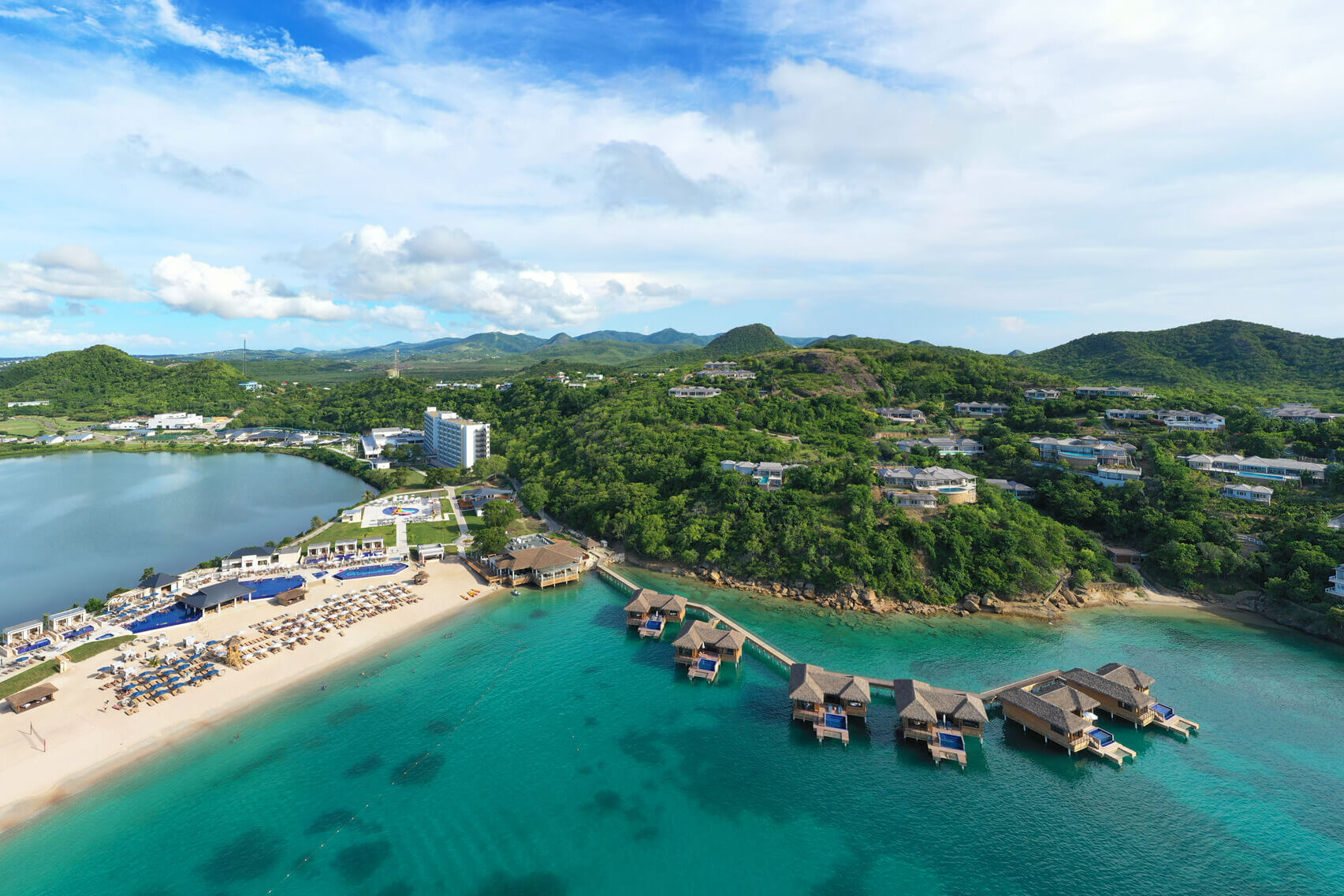 Aerial view of the Royalton Antigua Resort and Spa All Inclusive, including overwater villas and bungalows