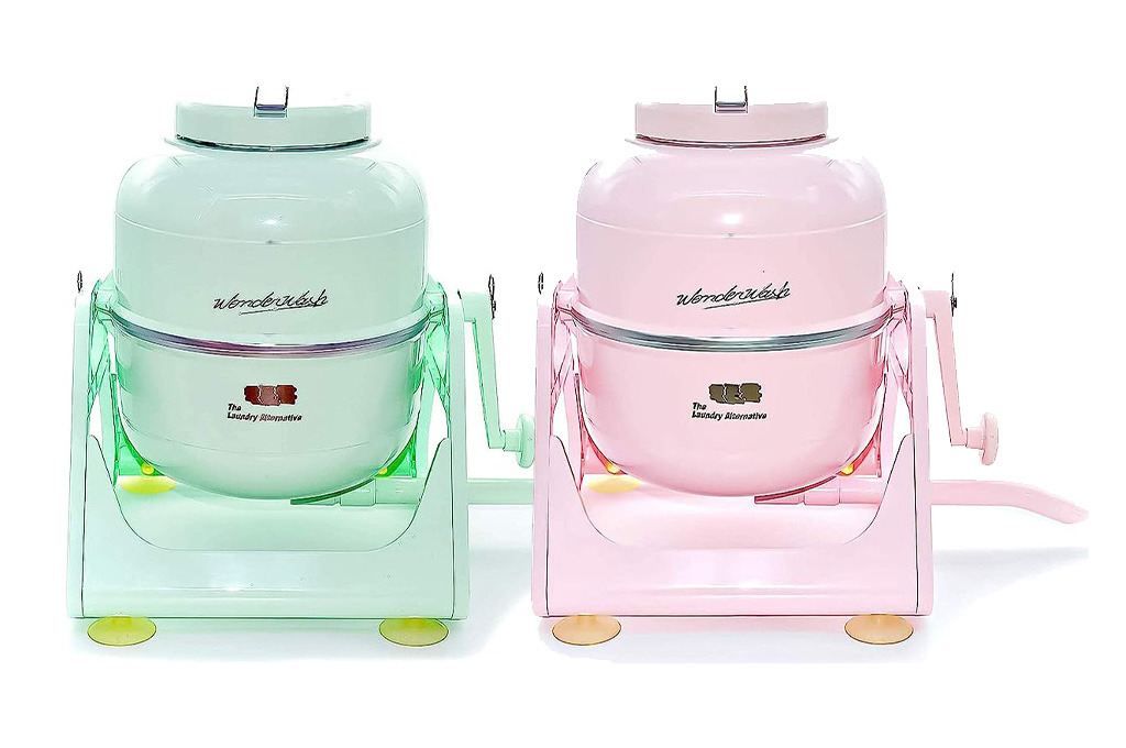 The Wonderwash portable washing machine in mint green and light pink