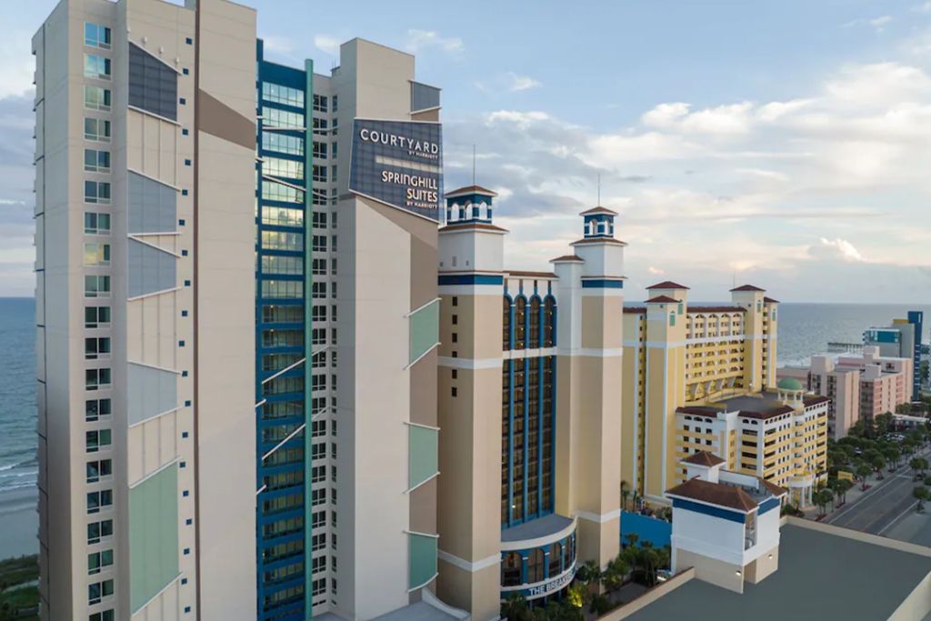 Aerial view of the front of the SpringHill Suites by Marriott Myrtle Beach Oceanfront angled looking left to right