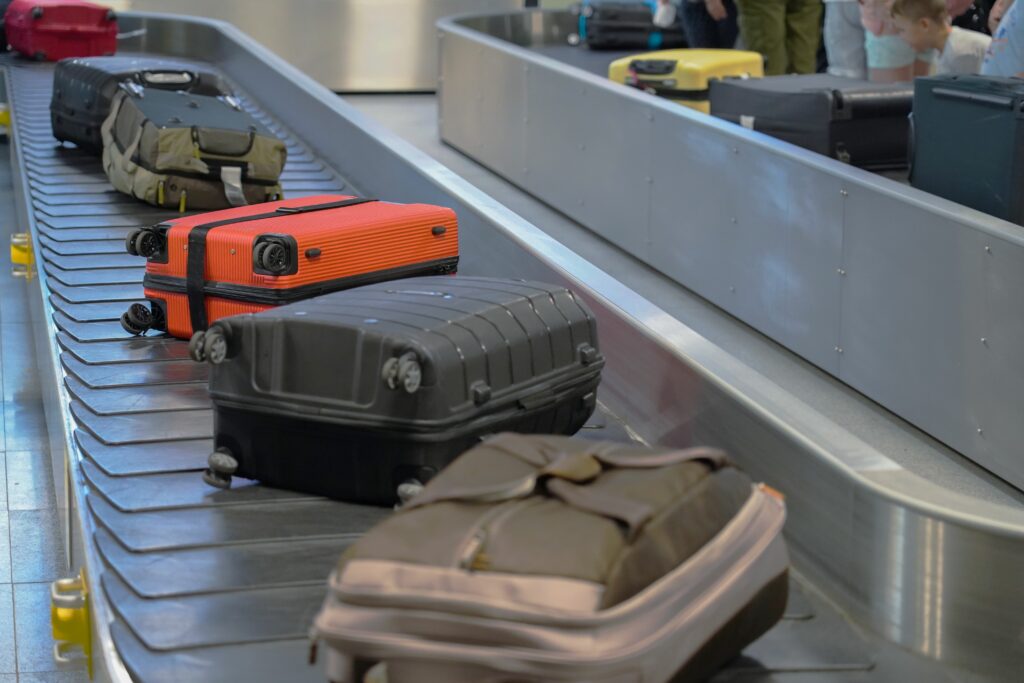 Luggage on baggage carousel at airport