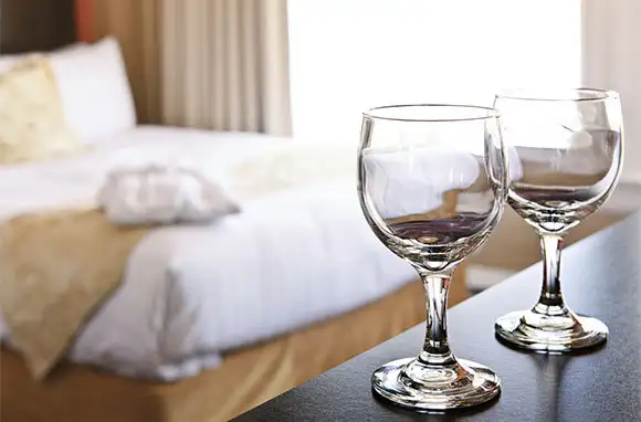 Some Hotel Housekeepers Polish Glasses with Furniture Polish