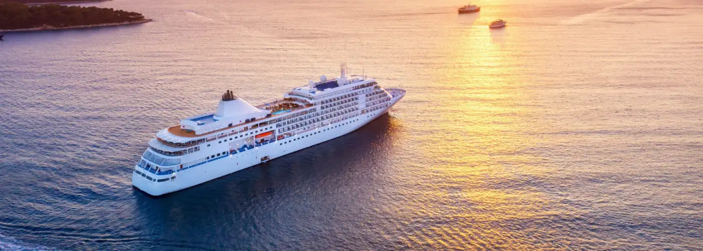 Aerial view of a cruise ship at sunset