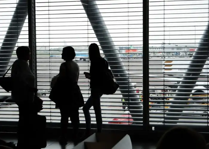 travelers at airport gate